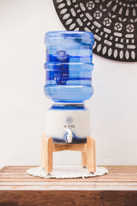 Beautiful Timber Stand with hi vibe ceramic and water bottle on top.